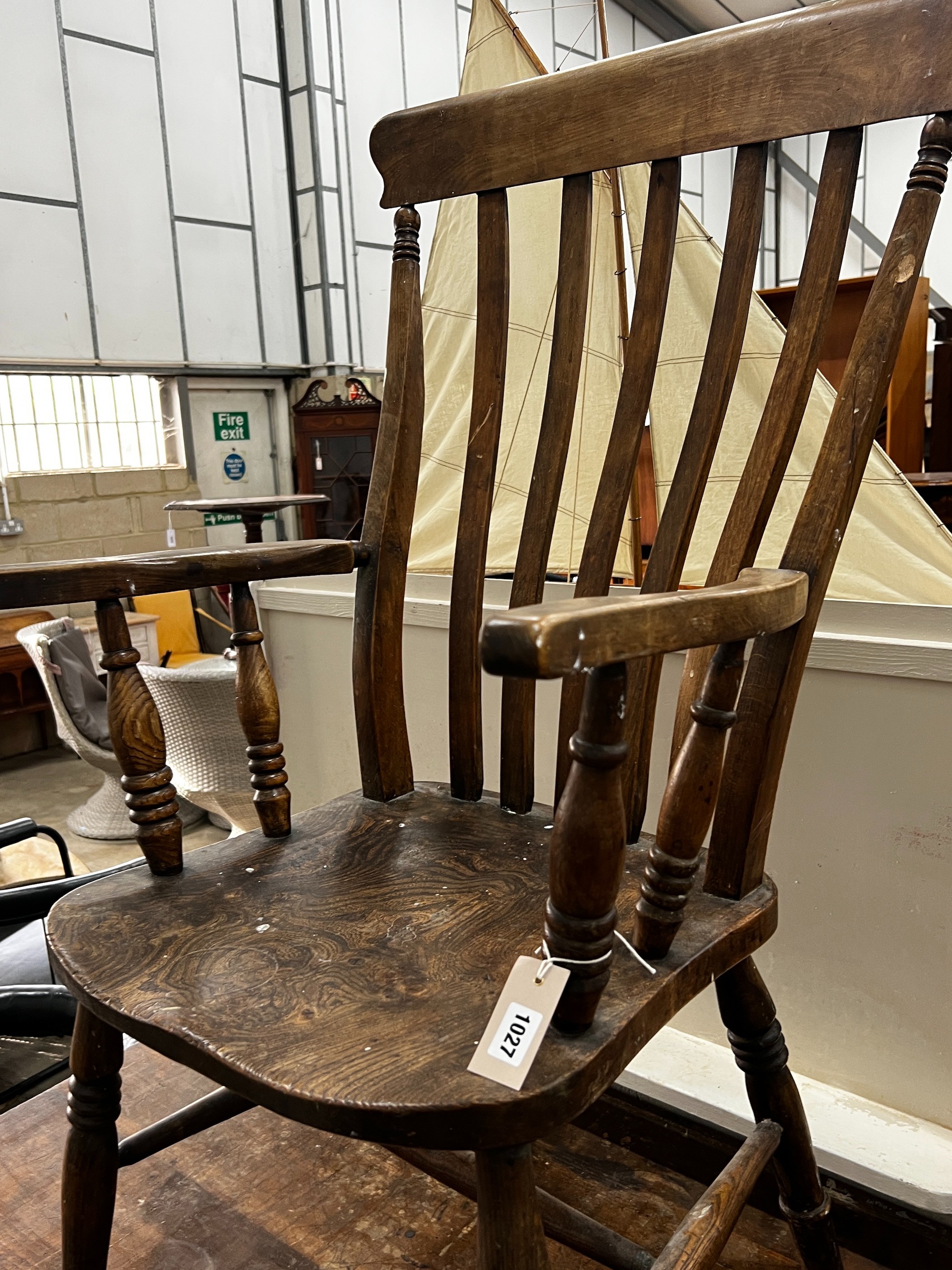 A Victorian elm and beech lathe back armchair, width 55cm, depth 47cm, height 113cm